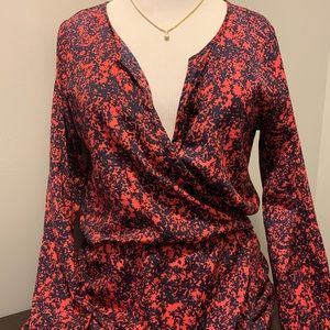 Red and navy faux wrap dress button cuff detail